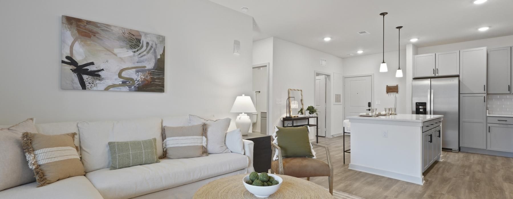 a living room with a couch and a table